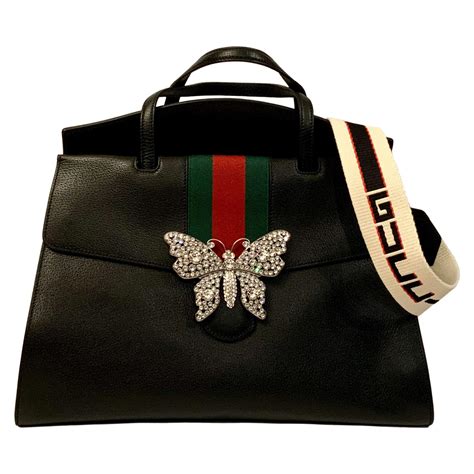 gucci butterfly handbag|Gucci butterfly purse.